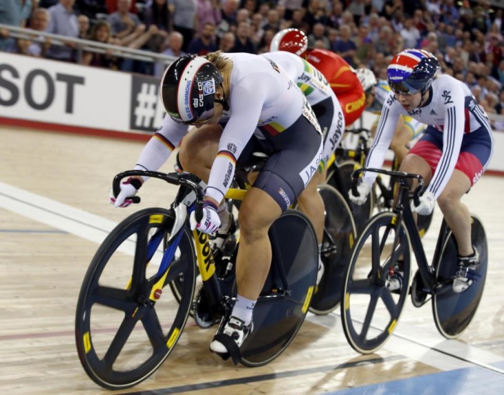 Germany's Kristina Vogel, front, crosses the finish line to win the Womens Keirin final race at the World Track Cycling championships in London, Thursday, March 3, 2016. At right is Britain's Rebecca James. (AP Photo/Alastair Grant)